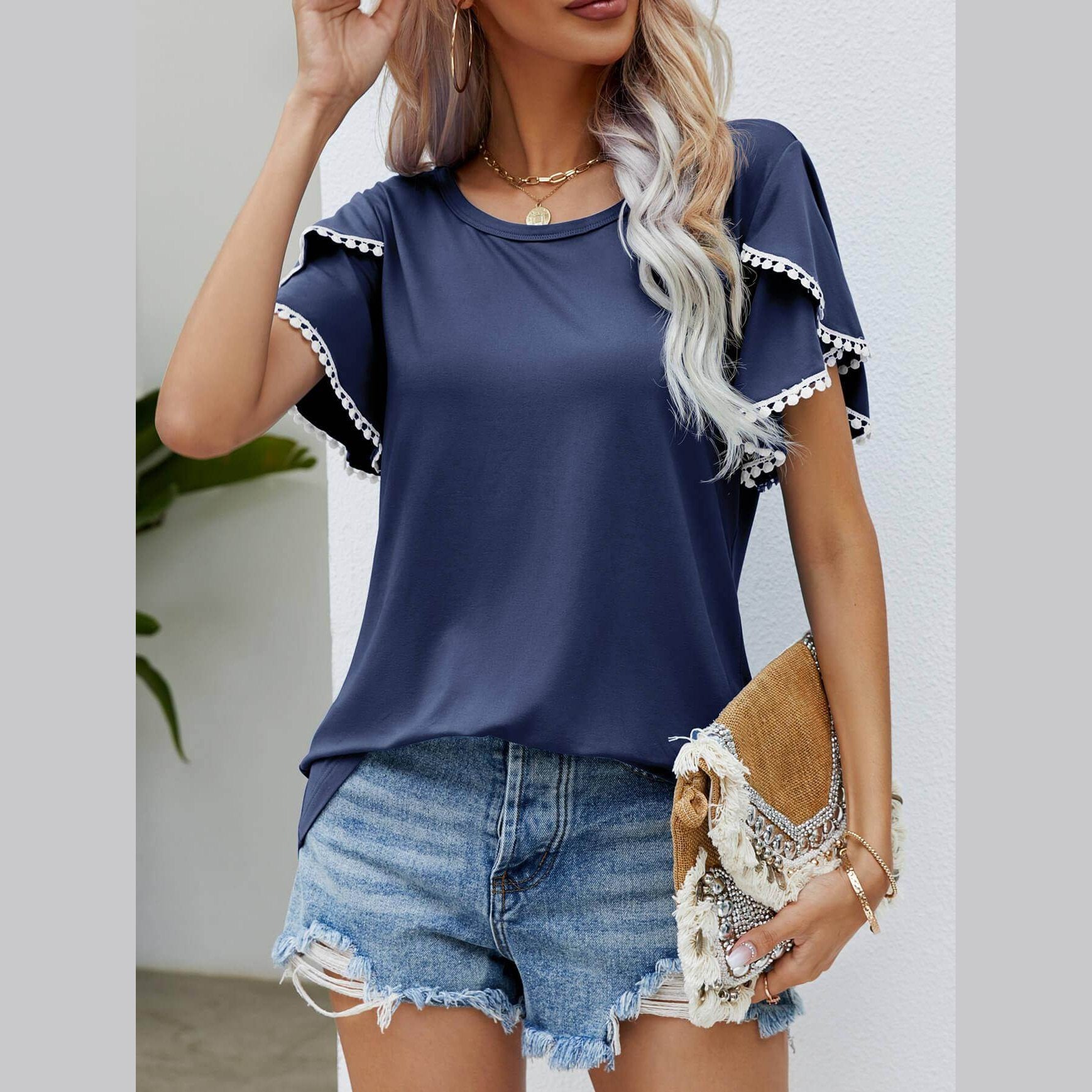 Trendsi women's pom-pom flutter sleeve tee in navy blue with decorative detailing and a casual fit