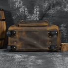 Premium leather wheeled duffel bag with sturdy wheels and durable base for easy transportation