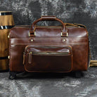 Premium leather wheeled duffel bag with sturdy handles and pockets for convenient travel