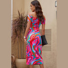 Trendsi printed split maxi dress in vibrant colors, perfect for summer outings and parties