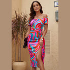 Trendsi printed split maxi dress in vibrant colors with off-shoulder design and stylish side slit