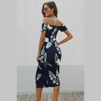 Trendsi women's printed split maxi dress featuring an off-shoulder design and tropical leaf pattern