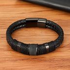 Punk stainless steel bracelet with braided leather and textured accents for men's fashion