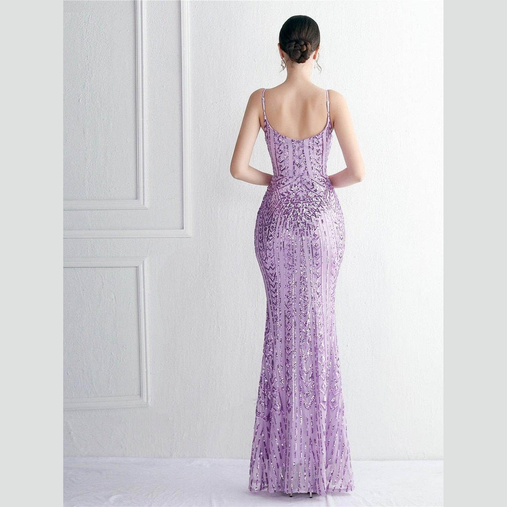 Back view of a stunning purple sequin dress women with a fitted silhouette and spaghetti straps