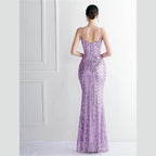 Back view of a stunning purple sequin dress women with a fitted silhouette and spaghetti straps