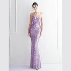 Elegant purple sequin dress women featuring a fitted silhouette and shimmering details for special occasions