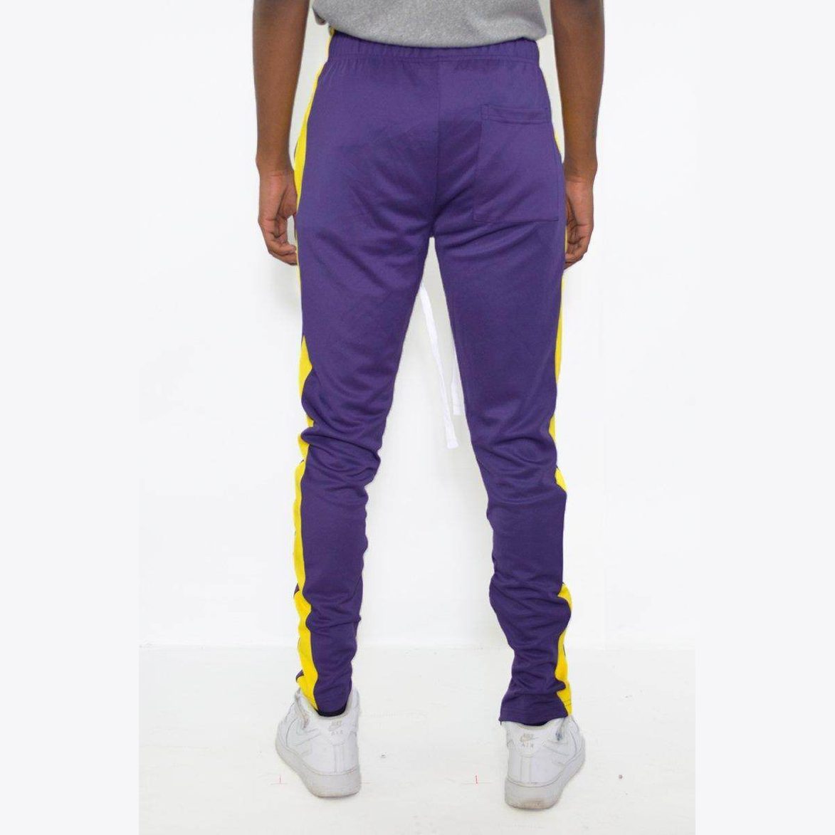 Men's purple yellow track pants by VacationGrabs with a comfortable fit and stylish design