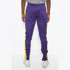 Men's purple yellow track pants by VacationGrabs with a comfortable fit and stylish design