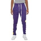 Men's purple yellow track pants from VacationGrabs with a comfortable fit and stylish look