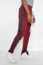 Red black jogger pants for men with side stripes and elastic waistband for comfortable fit