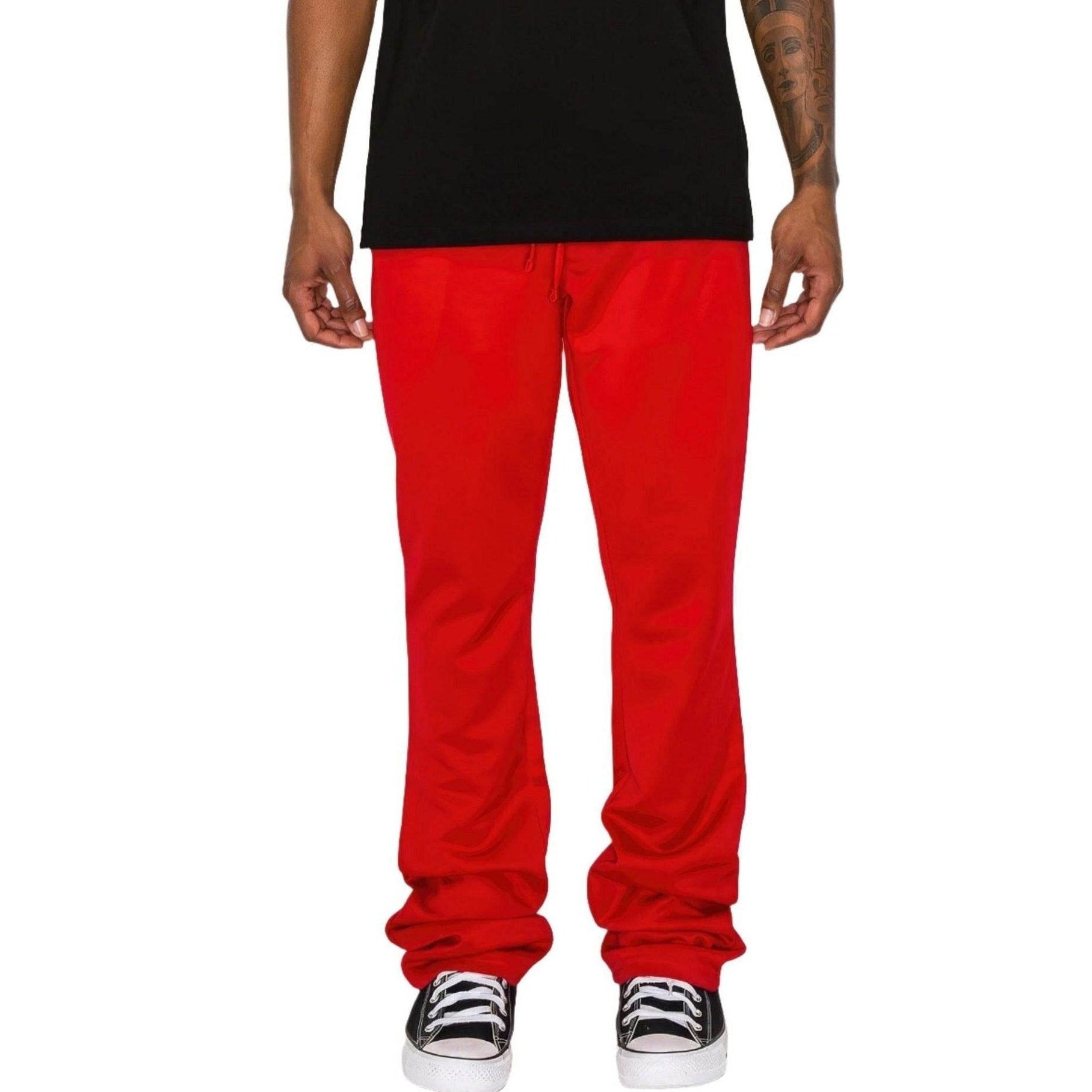 Men's red flare track pants by VacationGrabs, featuring a relaxed fit and drawstring waist