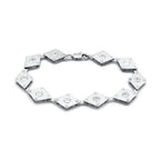 Rhodium brass geometric bracelet featuring sparkling crystals in a stylish design
