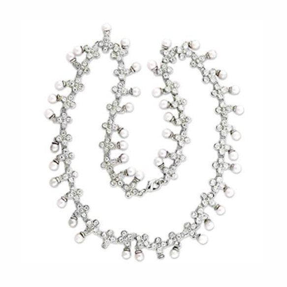 Elegant rhodium brass pearl necklace featuring sparkling accents and a sophisticated design