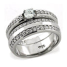 Rhodium plated CZ wedding band with sparkling center stone and intricate detailing for elegant wear