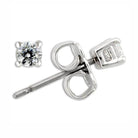 Rhodium plated sterling silver earrings featuring a stunning round cubic zirconia design perfect for any occasion