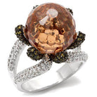 Rhodium statement cocktail ring featuring a large brown faceted stone and stylish band design