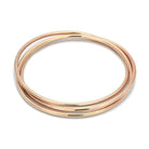 Set of stylish rose gold stacking bangles for women, perfect for layering and versatile fashion