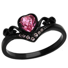 Stylish rose tiara crystal ring with a heart-shaped pink gemstone and intricate black band design