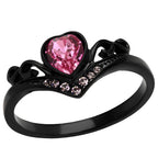 Stylish rose tiara crystal ring with a heart-shaped pink gemstone and intricate black band design