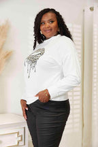 Trendsi round neck casual sweatshirt in white with stylish leopard print design for women