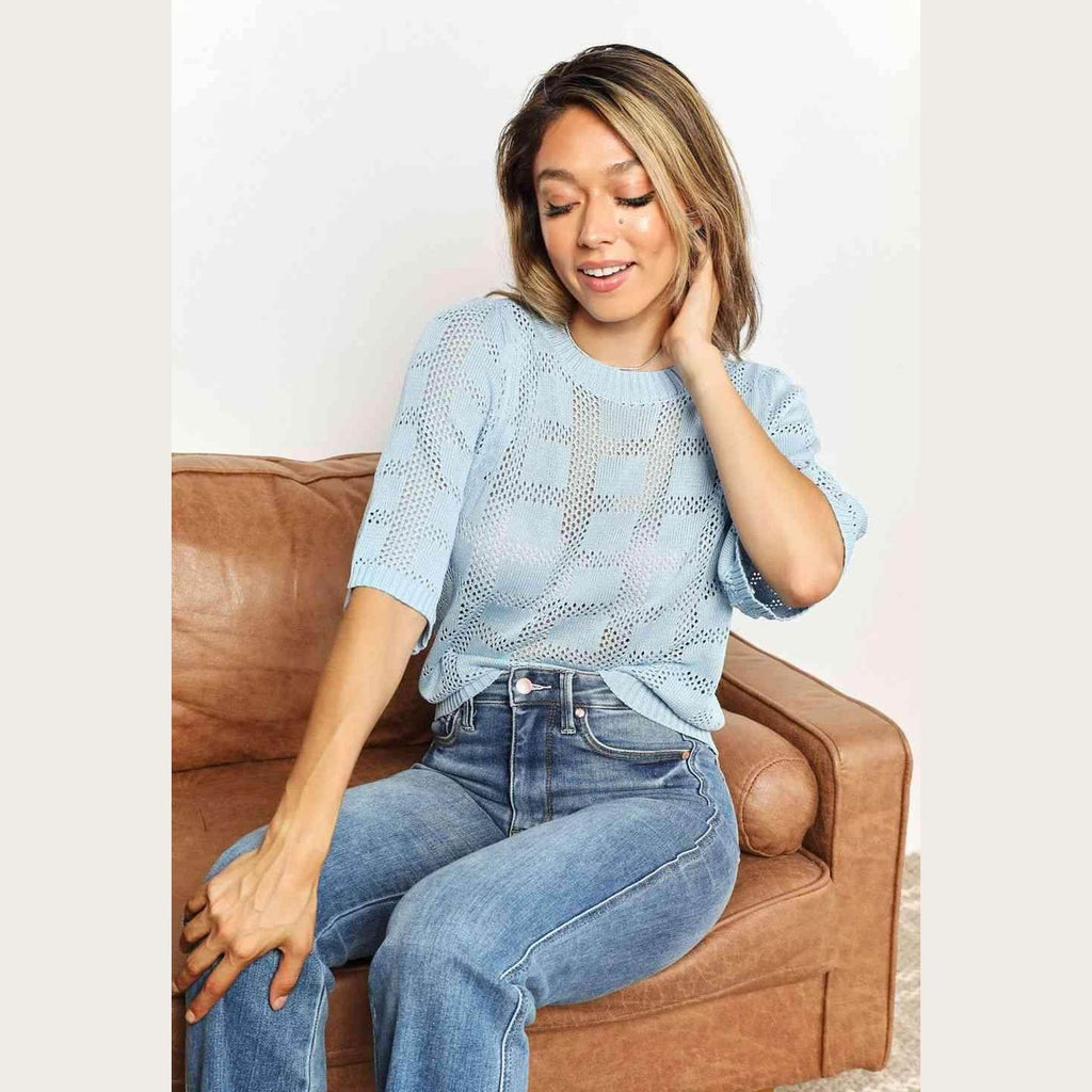 Light blue women's round neck knit top with patterned design, perfect for casual wear