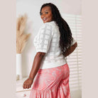 Trendsi Women's Round Neck Knit Top in White, featuring a stylish design and short sleeves