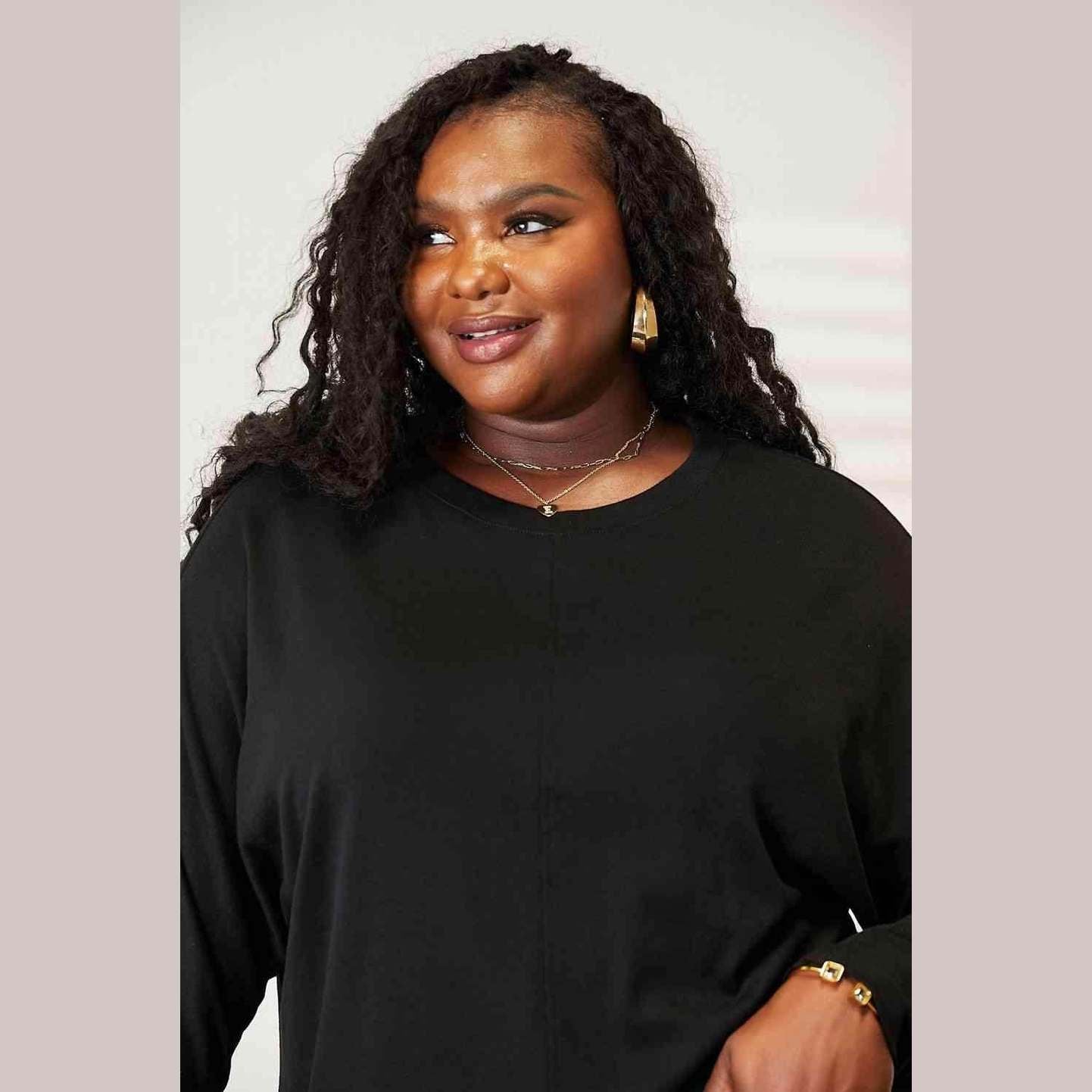 Trendsi round neck long sleeve top in black designed for comfort and style