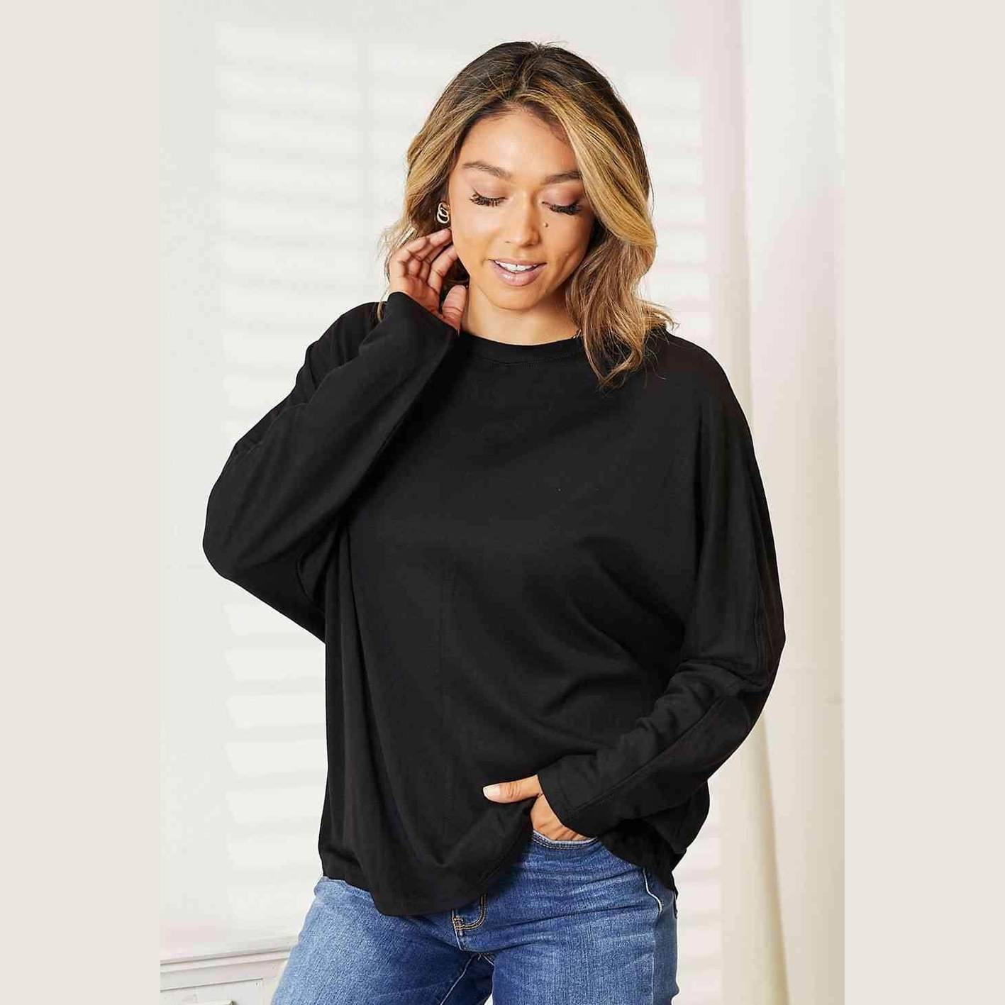 Trendsi Women's round neck long sleeve top in black, perfect for casual and comfortable outfits