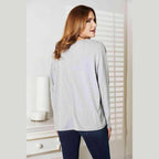 Trendsi Women's round neck long sleeve top in gray with a relaxed fit and stylish design