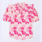 Trendsi ruffle shoulder blouse in pink floral pattern with tie-neck and puff sleeves