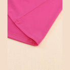 Trendsi Short Sleeve Summer Top in vibrant pink fabric showing the hem and sleeve detail