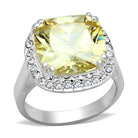 Silver cushion cut engagement ring featuring a stunning yellow gemstone surrounded by sparkling crystals