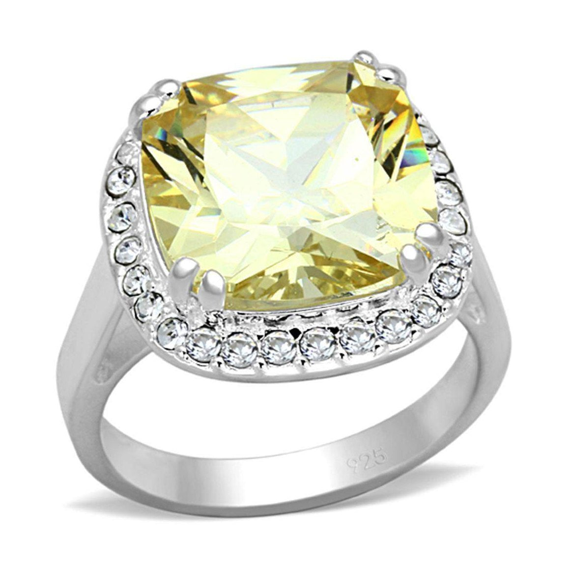 Silver cushion cut engagement ring featuring a stunning yellow gemstone surrounded by sparkling crystals