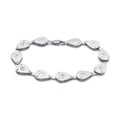 Elegant silver fashion bracelet for travel outfits with sparkling crystals for a chic look
