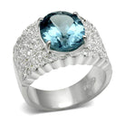 Stunning silver fashion ring for vacation featuring a large blue gemstone and sparkling details