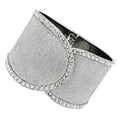 Silver glitter wide bangle bracelet featuring rhinestone accents for a stylish look