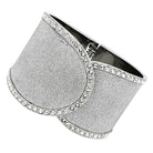 Silver glitter wide bangle bracelet featuring rhinestone accents for a stylish look