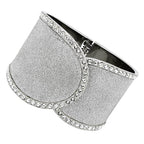 Silver glitter wide bangle bracelet featuring rhinestone accents for a stylish look