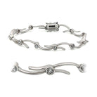 Elegant silver tone vacation jewelry bracelet featuring sparkling stones and a sleek design for stylish occasions