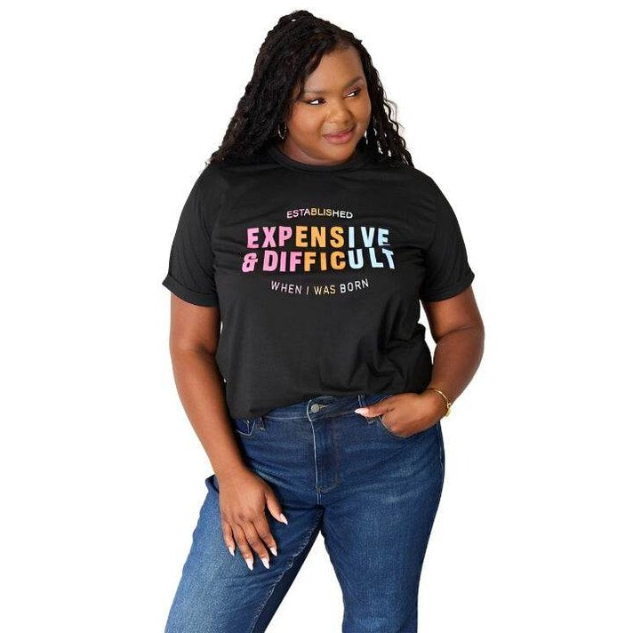 Simply Love tee in black featuring playful text about being expensive and difficult when born