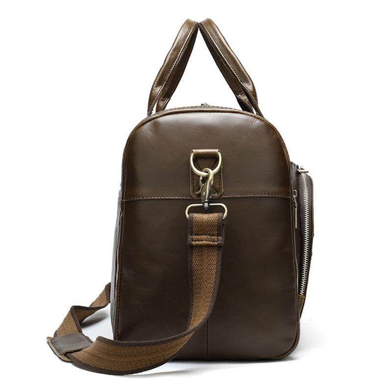 Soft leather travel duffel bag in brown with sturdy handles and adjustable strap for easy carrying