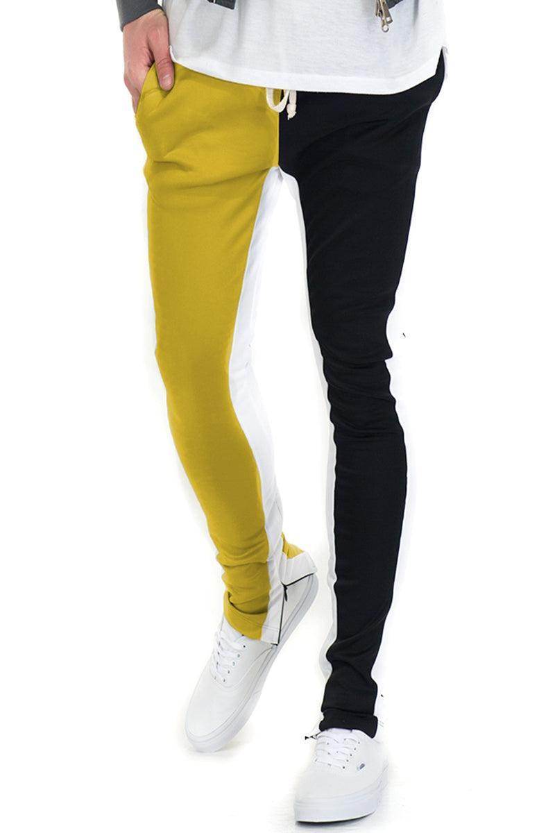 Stylish split track pants for men in yellow and black, perfect for casual wear and workouts