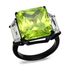 Bold statement cocktail ring for women with a large green gemstone and two clear accent stones