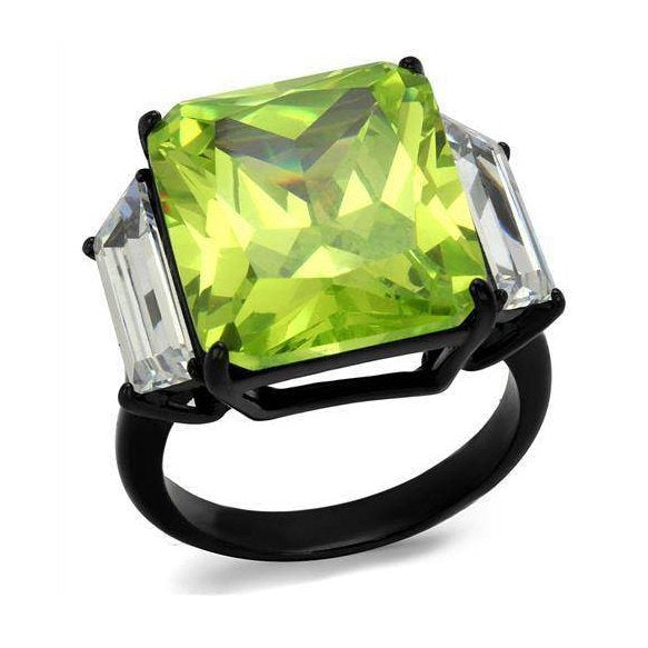 Bold statement cocktail ring for women with a large green gemstone and two clear accent stones