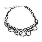 Elegant black beaded statement necklace rhodium brass with intricate loop design for a chic look