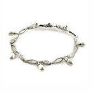 Elegant sterling silver bracelet for women featuring pearl accents and intricate design