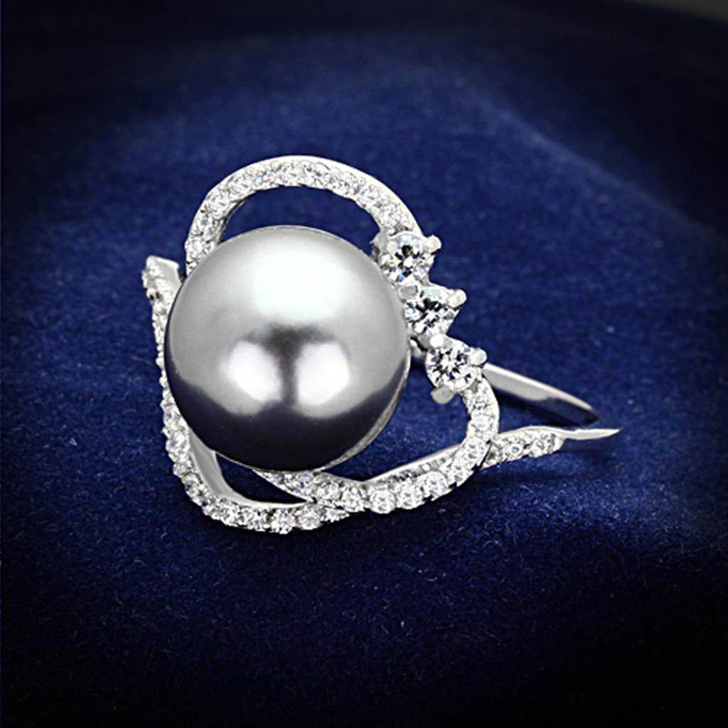 Stunning sterling silver cocktail ring featuring a large grey pearl surrounded by sparkling stones