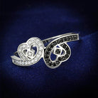Sterling silver heart ring for women featuring sparkly black and white stones in a stylish design