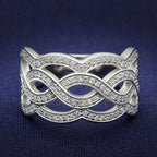 Beautiful sterling silver statement ring for women featuring an elegant wave design with sparkling accents