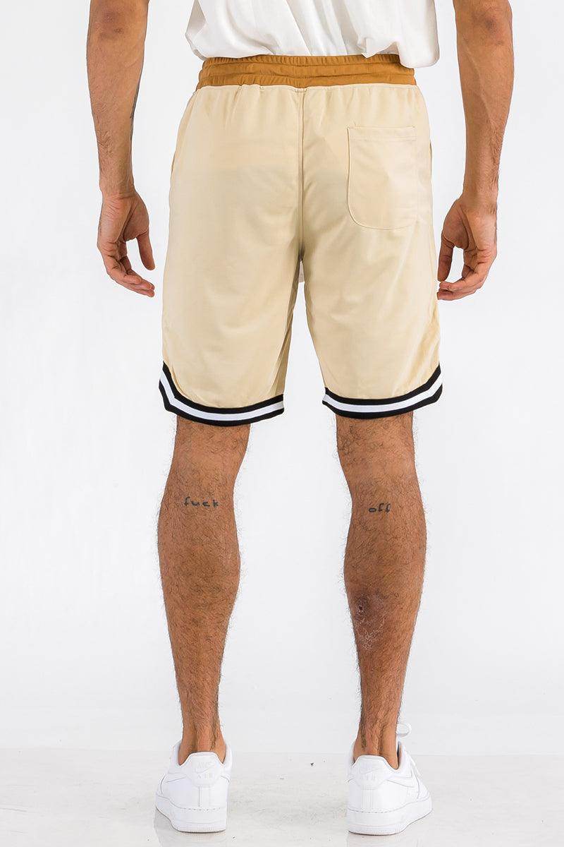 Men's striped active Jordan shorts in beige with black and white stripe detailing on sides